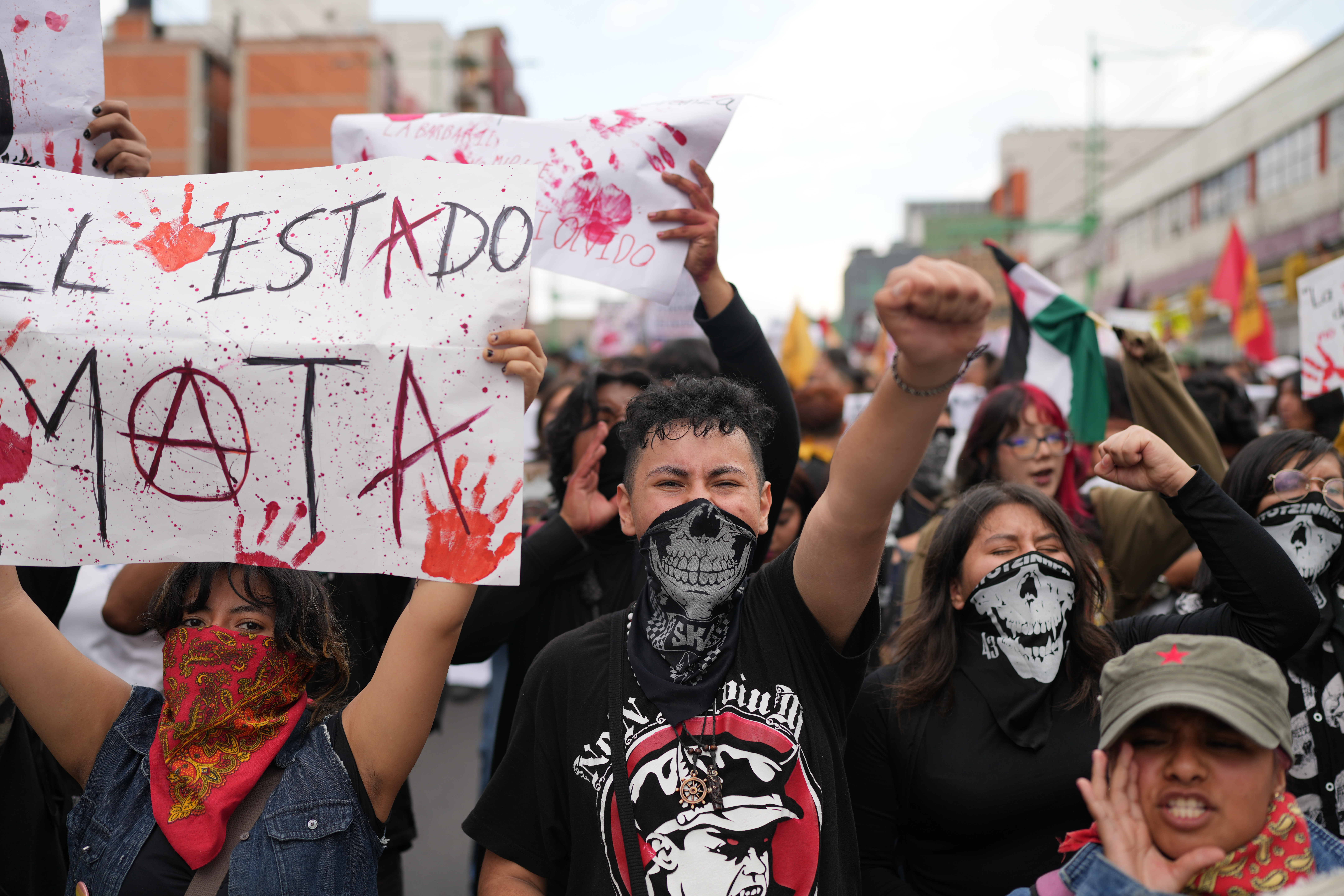 Demonstrators march during a protest commemorating the anniversary of the 1968 Tlatelolco killings, when soldiers fired on student protesters, in Mexico City, Thursday, Oct. 2, 2025. (AP)